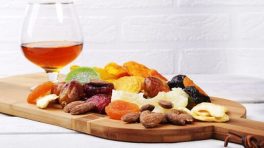 Organic,Healthy,Assorted,Dried,Fruit,And,Glasses,With,Cognac,Or